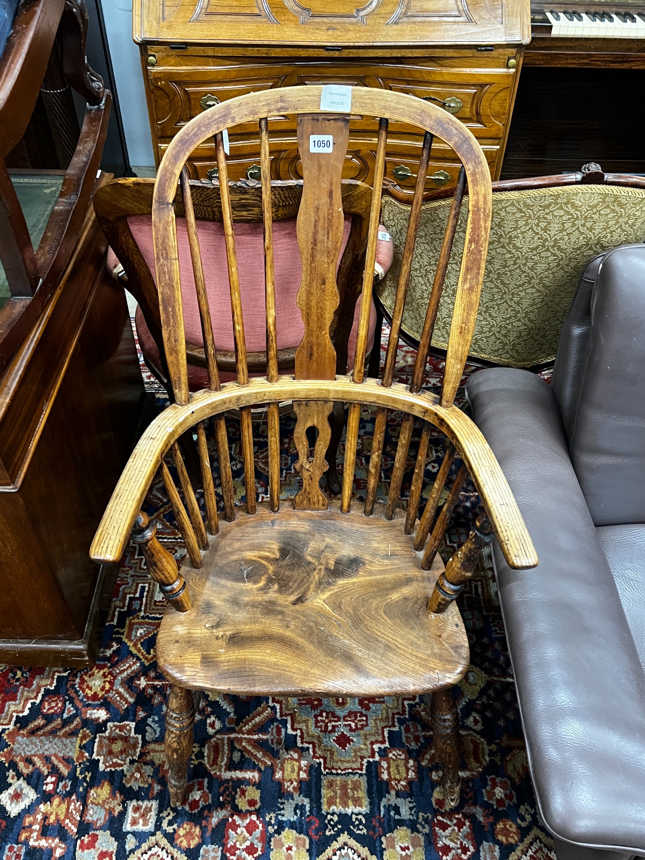 A Victorian ash, elm and beech Windsor armchair, width 57cm, depth 38cm, height 110cm